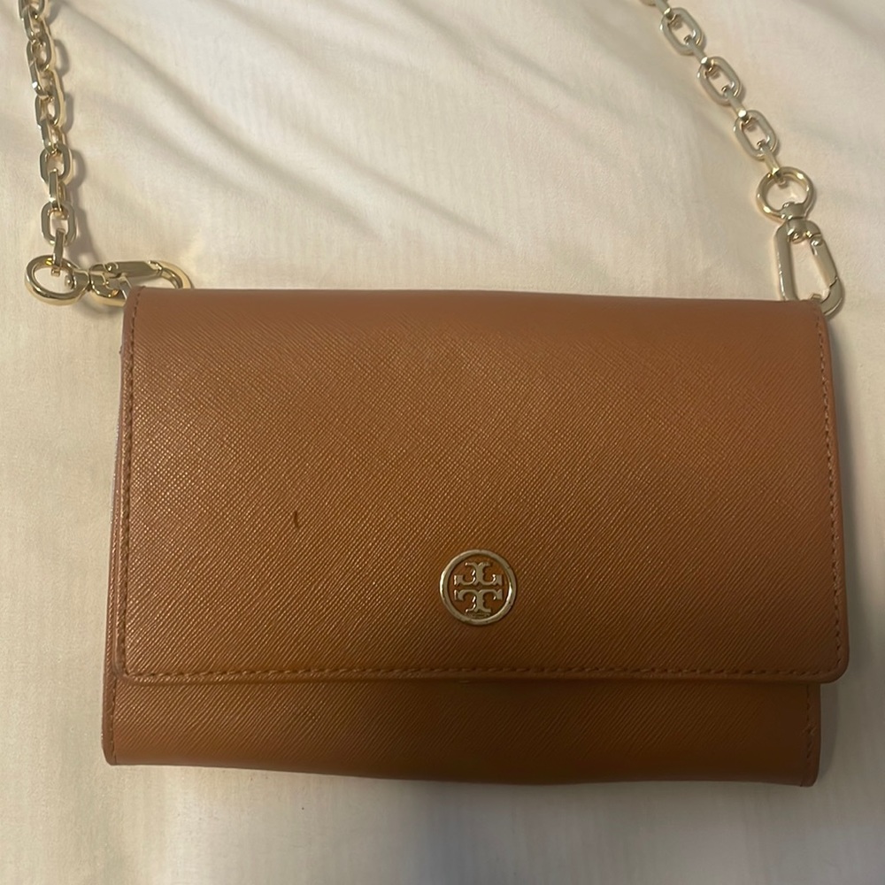 Tory Burch camel colored crossbody wallet bag.  Fits cell phone and keys.